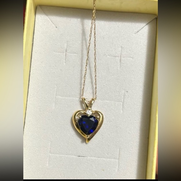 10k gold heart shaped necklace with sapphire